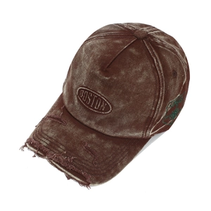 Vintage washed brown baseball cap with Boston embroidery and distressed ripped brim