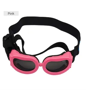 Pink UV-resistant pet goggles with adjustable strap and dark lenses for small dogs