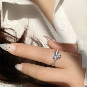 Minimalist heart-shaped pink diamond ring in silver finish with micro-pave band setting