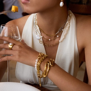 Elegant layered 18k gold plated pearl necklace set with matching bracelet and earrings