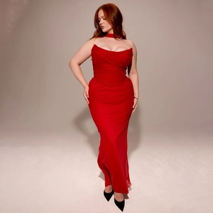 Detail of red tube top maxi dress with matching neck scarf and ruched texture fabric