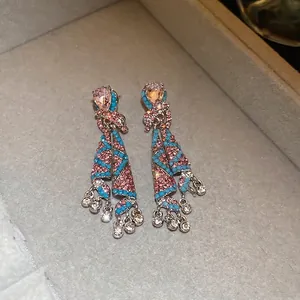 Silver needle long tassel drop earrings with pink crystals and blue bead accents