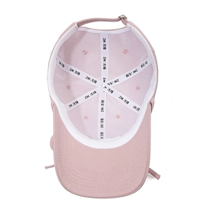 Pink ribbon baseball cap interior view showing high-quality stitching and metal buckle