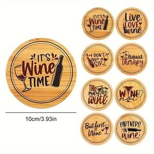 Detail showing various engraved wine quotes on round 10cm bamboo coasters for home decor