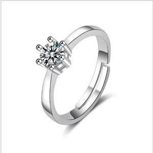 Polished 18K white gold plated six-prong solitaire ring with brilliant round stone