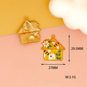 Detailed view of beehive charms with enamel flowers and size markings: 29.5mm by 27mm
