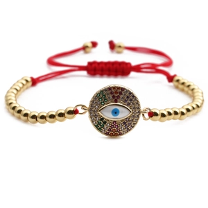 Adjustable red cord Turkish Evil Eye bracelet with gold beads and colorful zircons