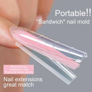 Close-up of dual-layer sandwich nail extension mold for professional manicure shaping