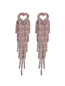 Detailed macro view of long luxury tassel earrings with rose pink gradient rhinestones