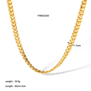 Detailed 7mm width and 34.9g weight specifications for the 18K gold Cuban chain necklace