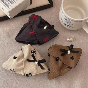 Chic tweed bow hair clips in black, beige and brown with elegant French style charms