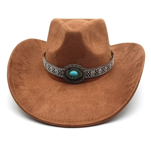Detail of caramel suede cowboy hat with ethnic woven band and turquoise stone accent