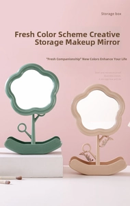Cloud-shaped makeup mirror with adjustable stand and jewelry storage base detail