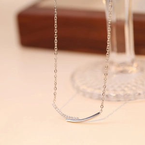 Elegant silver smile necklace with micro-inlaid zircons on a delicate chain jewelry box