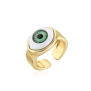 Detail of 18K gold-plated evil eye ring featuring a green center and hammered texture
