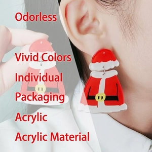 Asymmetric Christmas earrings featuring Santa suit design with festive red acrylic and gold buckle