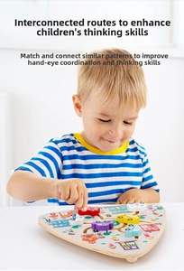 Detail of a child moving car sliders on a wooden maze toy to improve logical thinking