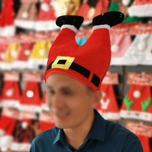 Funny Christmas hat with upside down Santa legs design and belt detail for party wear