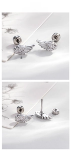 Detailed view of silver angel wing stud earrings featuring micro-set zircon and threaded backs