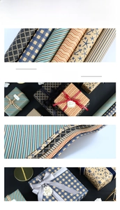 Detail of dark plaid gift wrapping paper with nautical motifs and vintage textures