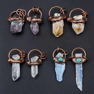 Handmade copper wire wrapped pendants in amethyst, citrine, clear quartz, and kyanite