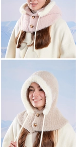 Detail of plush balaclava hat with dual buttons and adjustable drawstrings for winter warm