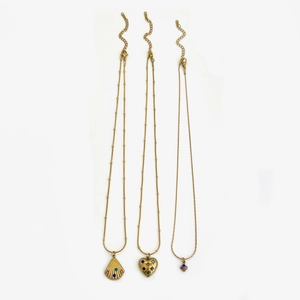 Gold stainless steel necklace set with shell heart and petal pendants and colorful zircon