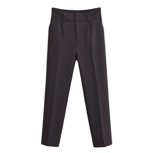 Detail view of high-waist dark brown dress pants showing the waistband and fabric texture