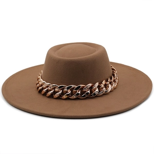 Detailed shot of brown wool felt wide brim hat featuring a decorative chunky gold chain