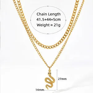 Double-layered gold snake necklace with cuban link chain and scale textured pendant