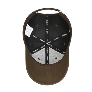 Interior view of cotton baseball cap featuring reinforced seams and adjustable metal buckle
