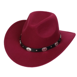 Detail of burgundy felt cowboy hat with a black leather band and silver metal studs
