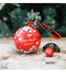Detail view of 6.8cm red tinplate wedding favor ball with pink flowers and hanging ribbon