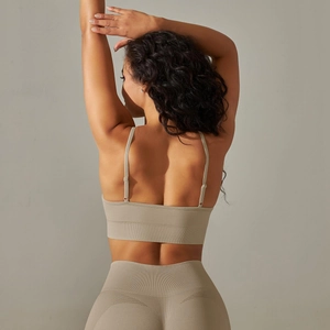 Detail of seamless ribbed sports bra and leggings with breathable back texture