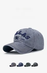 Detail of vintage washed baseball cap featuring blue DALLAS 1841 3D embroidery and stars