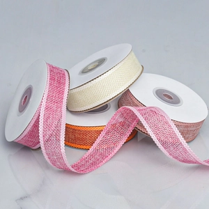 Close-up of colorful burlap ribbons with woven texture and neat stitched edges