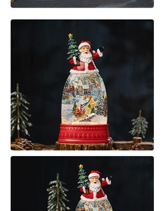 Close-up of a musical Christmas snow globe with Santa Claus on a red embossed base
