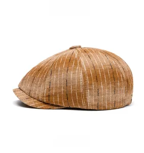 Side view of striped newsboy cap in light brown with classic British texture detail