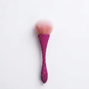 Oversized powder brush with pink rhinestone handle and soft gradient bristles