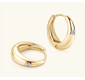 Detail of S925 sterling silver stamp and 0.06CT engraving on gold moissanite hoop earrings