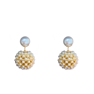 Elegant gold-plated cluster pearl earrings with sterling silver needles on white backdrop
