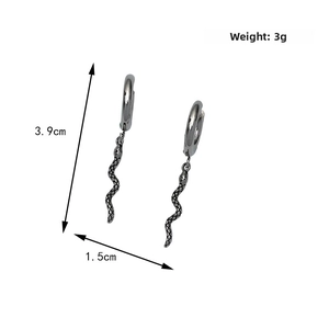 Detailed view of snake drop earrings with scales, measuring 3.9cm by 1.5cm and 3g weight
