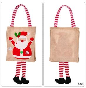 Front and back view of Santa Claus burlap gift bag with striped legs and handle