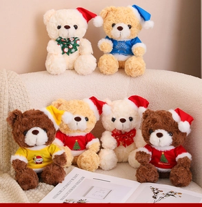 Group of Christmas teddy bears in various colors with festive hats and holiday outfits