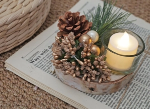 Christmas candle holder with pine cones, golden berries and wood base for table decor