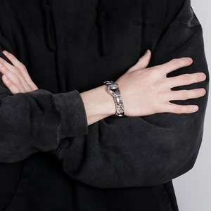 Men's punk style stainless steel Cuban link bracelet featuring a boxing glove charm