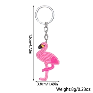 Pink flamingo beaded keychain accessory with size labels: 12cm length and 8g weight