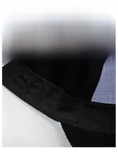 Detail of the baseball cap's widened sweatband and breathable black cotton fabric