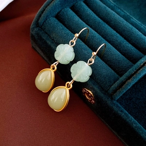 Detail of New Chinese style natural stone earrings with gold butterfly floral motif