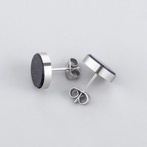 Punk style titanium steel stud earrings with deep blue starry sand stone inlay